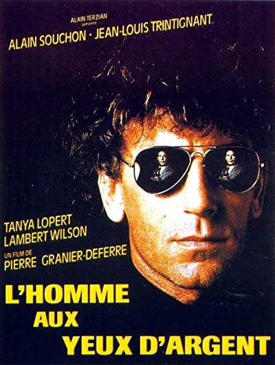 L'homme Aux Yeux D'argent (1985) afişi L'homme Aux Yeux D'argent (1985) afişi